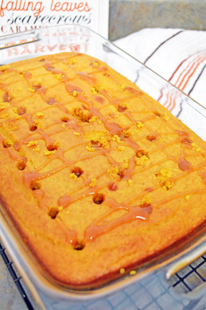 pumpkin poke cake filled with caramel sauce